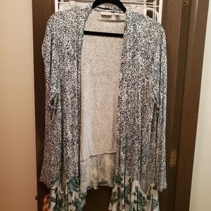 Logo by Lori Goldstein Cardigan